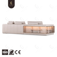 Canapé modulable en cuir microfibre beige clair de luxe sur mesure avec meuble de rangement d'angle et canapé modulaire de style capitonné