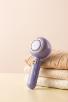 Dissolvant de peluches en plastique léger compact boulochage rasoir de vêtements fonction de chauffage électrique 1 an à la mode usage domestique