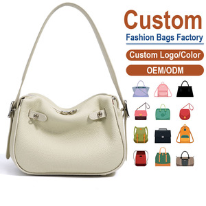 กระเป๋าสะพายข้างผู้หญิง ลายลิ้นจี่ สายเดี่ยว ตกแต่งหมุด ป้องกันการโจรกรรม เหมาะสำหรับฤดูร้อน ใช้ได้ทั้งที่ทำงานและในชีวิตประจำวัน หรูหรา - Product Image 1