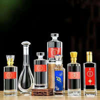 Machine de remplissage de vodka de vin à pression négative entièrement automatique pour emballer les boissons aux fruits dans des bouteilles en verre en plastique
