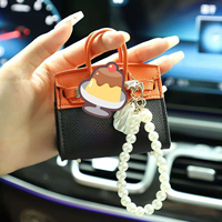 Nouveauté 2026 : Mini porte-sacs de luxe, ornements, porte-monnaie mignon, porte-clés, étui pour écouteurs pour femmes, porte-clés zéro