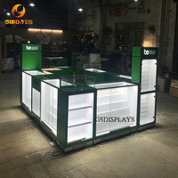 Kiosque modulaire en forme de L vert pour téléphones portables avec clés et rangement pour la vente de produits d'accessoires mobiles
