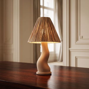Lampe de table en céramique beige rustique, avec un abat-jour en raphia plissé et une base ondulée minimaliste de style balinais. - Product Image 3