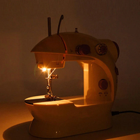 Mini machine à coudre portable électrique améliorée, transparente, petite, pour travaux d'aiguille domestiques