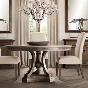 Table à manger ronde en bois massif de style européen vintage, design français de luxe léger, durable, 8 places, pour salles à manger d'hôtel - Product Image 1