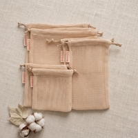Sac de rangement en filet écologique beige naturel pour le linge et l'emballage de fruits, avec cordon de serrage, vente en gros