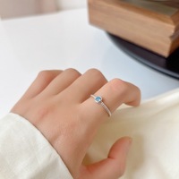 Bague fine ajustable en argent sterling 925 avec zircon bleu et motif corde torsadée