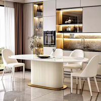 Vente chaude Table à manger ovale moderne avec pierre frittée Top 6 personnes Ensemble de meubles de salle à manger pour villas