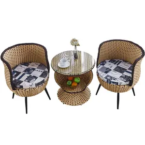 Einfacher kreativer Rattan-Stuhl dreiteilig Balkon-Kombination für Wohnzimmer im Freien kleine Tischstühle für Innenhof