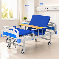 Lit d'hôpital manuel pour usage en salle de soins ou à domicile, avec garantie d'un an