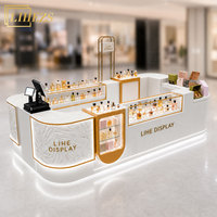 Kiosque de présentation de parfums personnalisé de style moderne et luxueux en marbre blanc et bois avec éclairage LED pour centre commercial