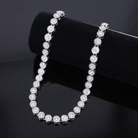 Collier chaîne tennis ronde sertie de pierres, bicolore or et argent, pour le style hip-hop streetwear et le glamour des festivals