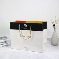 Sac en papier cadeau de luxe sur mesure de haute qualité avec poignée pour vêtements, bijoux, chaussures, avec votre propre logo