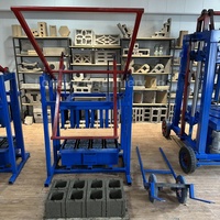Petite machine manuelle de fabrication de pavés en ciment avec pression hydraulique, facile à utiliser, très vendue en Afrique à bas prix