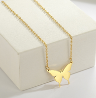 Collier unisexe, minimaliste, élégant et polyvalent en acier inoxydable pour couple, avec un motif papillon.