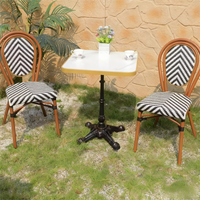 Balcon extérieur Table et chaises françaises Chaises de bistrot en rotin osier Mobilier de restaurant Ensemble table de café