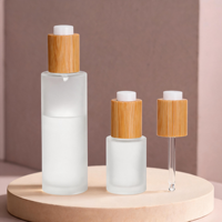 Botol Tetes Kaca Buram Transparan dengan Tutup Bambu Logo Kustom - Ideal untuk Aromaterapi, Kecantikan & Perawatan Kulit DIY