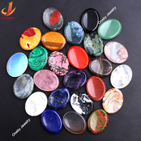 Vente en gros 35x45mm pierre de pouce artisanat naturel poche de paume polie ovale énergie de guérison 7 Chakra cristal naturel artisanat pierre d'inquiétude