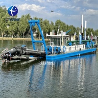 Bateau de dragage ETERNE pour le nettoyage des réservoirs et des fosses de petits volumes, alimenté par un moteur diesel