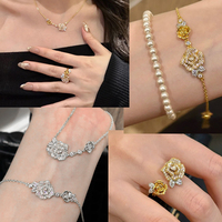 Parure de bijoux LUOYUNE plaqué or 18 carats en laiton, motif fleur de rose, avec collier, bracelet et bague en oxyde de zirconium, pour mariage, vente en gros, OEM