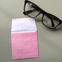 Mini-enveloppe de lentille imprimée personnalisée Sac de protection rembourré pour lentille optique Papier couché Impression offset pour montre et coloré