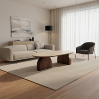 Table basse ovale moderne de style mid-century, de luxe, durable, beige clair, plateau lisse, stable, en bois de noyer massif, pour villa et hôtel