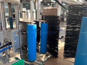 Machine d'étiquetage automatique horizontale pour bouteilles rondes, vente chaude, pour liquides buvables, bouteilles en verre, boissons énergisantes, bouteilles en plastique - Product Image 5