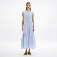 Nouvelle Robe Midi Femme Bleu Clair à Col Rond Manches Courtes Taille Smockée Plissée Asymétrique à Volants Personnalisée Vente en Gros