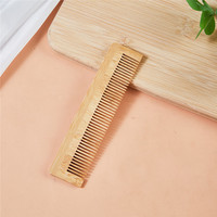 Peigne à dents larges avec logo personnalisé en gros Peigne à cheveux en bois de bambou naturel bon marché pour hôtel