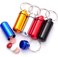 Porte-clés bouteille de pilules en alliage d'aluminium de qualité supérieure avec bouchons d'oreille