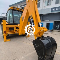 Chargeuse-pelleteuse JCB 4CX d'occasion, machine d'origine, équipement de construction