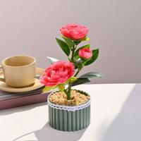Plante artificielle en pot de camélia, faux bonsaï de camélia avec bordure en dentelle, pot vert à rayures verticales pour la maison