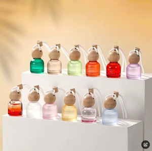 จี้น้ำหอมในรถระดับไฮเอนด์ขนาด10มล. สีสันสดใสขวดเปล่าพร้อมฝาเกลียวปรับแต่งโลโก้ได้ - Product Image 1