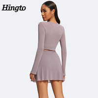 Haute qualité personnalisé vente en gros nouvelle tendance 2 pièces à manches longues cardigan court en maille à nouer et jupe pétale en maille détachable pour femmes