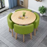 Ensemble de table à manger moderne et simple, table ronde avec chaises entièrement rétractables pour usage domestique ou de négociation en petit espace