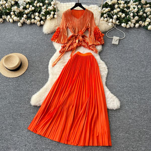 Set Casual da donna tunica con scollo a V Top e vita alta gonne a pieghe 3D Set abbigliamento americano all'ingrosso - Product Image 1