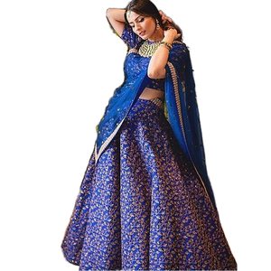 Collection de robes de mariée Lehenga en soie brute brodée de créateur bleu élégant - Product Image 1