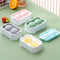 Boîte à glace sphérique en plastique en gros d'usine couvercle fait maison moule de hockey à glaçons à usage domestique pour les fabricants de crème glacée faits maison