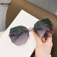 Bettega nouveau style lunettes de soleil sans cadre pour femmes lunettes de soleil à la mode et océan pour rue à la mode et à la mode