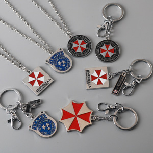 Nuevas llegadas Resident <span class=keywords><strong>Evil</strong></span> llaveros de metal al por mayor paraguas coche llavero película Logo llavero promocional Accesorios - Product Image 2