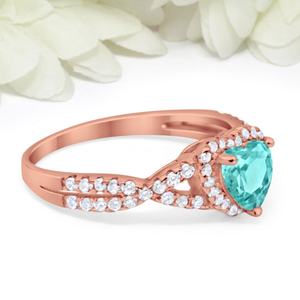 แหวนแต่งงาน/หมั้น ดีไซน์ใหม่ล่าสุด เงินแท้ S925 ประดับเพชร CZ ทรงกลม และพลอยพาราไบต์ทรงรี ดีไซน์เกลียว - Product Image 5