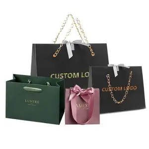 Wholesale Custom Printed Premium Luxury Deluxe Boutique Golden Stamping Shopping Gift Paper Bag With Ribbon