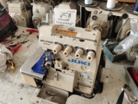Machines à coudre d'occasion Japon Juki Mo 6700 Overlock Machines industrielles d'occasion pour vêtements et textiles Pièces de rechange ne manquant pas