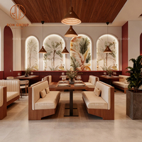 Ensemble de mobilier moderne pour hôtel, restaurant, café, fast-food : table carrée en bois et cuir, chaises, banquette et sièges de type canapé pour cafétéria