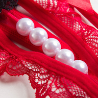 String en dentelle respirante culotte dos nu ouverte avec nœud dames T dos sous-vêtements taille basse Transparent Sexy nuisette Lingerie