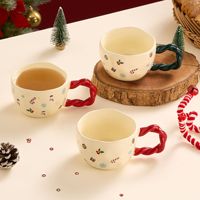 Tasse de conception de noël motif de père noël dessin animé tasse de souvenir en céramique tasse de cadeau de noël de vacances mignonne