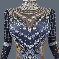 Combinaison moulante chic et sexy à manches longues ornée de strass, idéale pour les spectacles de danse en club et sur scène, en spandex