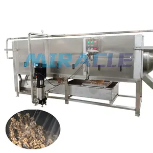 Équipement de traitement électrique d'épluchage de noyau de noix Chaîne de production industrielle automatique d'épluchage de noix
