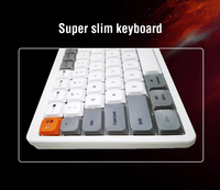 Nouvelle sortie 75% Super Slim Mini pour BT 2.4G Mode double Clavier ergonomique à touches séparées à ciseaux