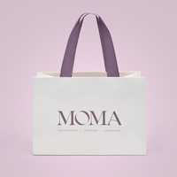 Sac en papier kraft écologique personnalisé de luxe pour vêtements, sac à poignée conçu pour le shopping et l'emballage de cadeaux